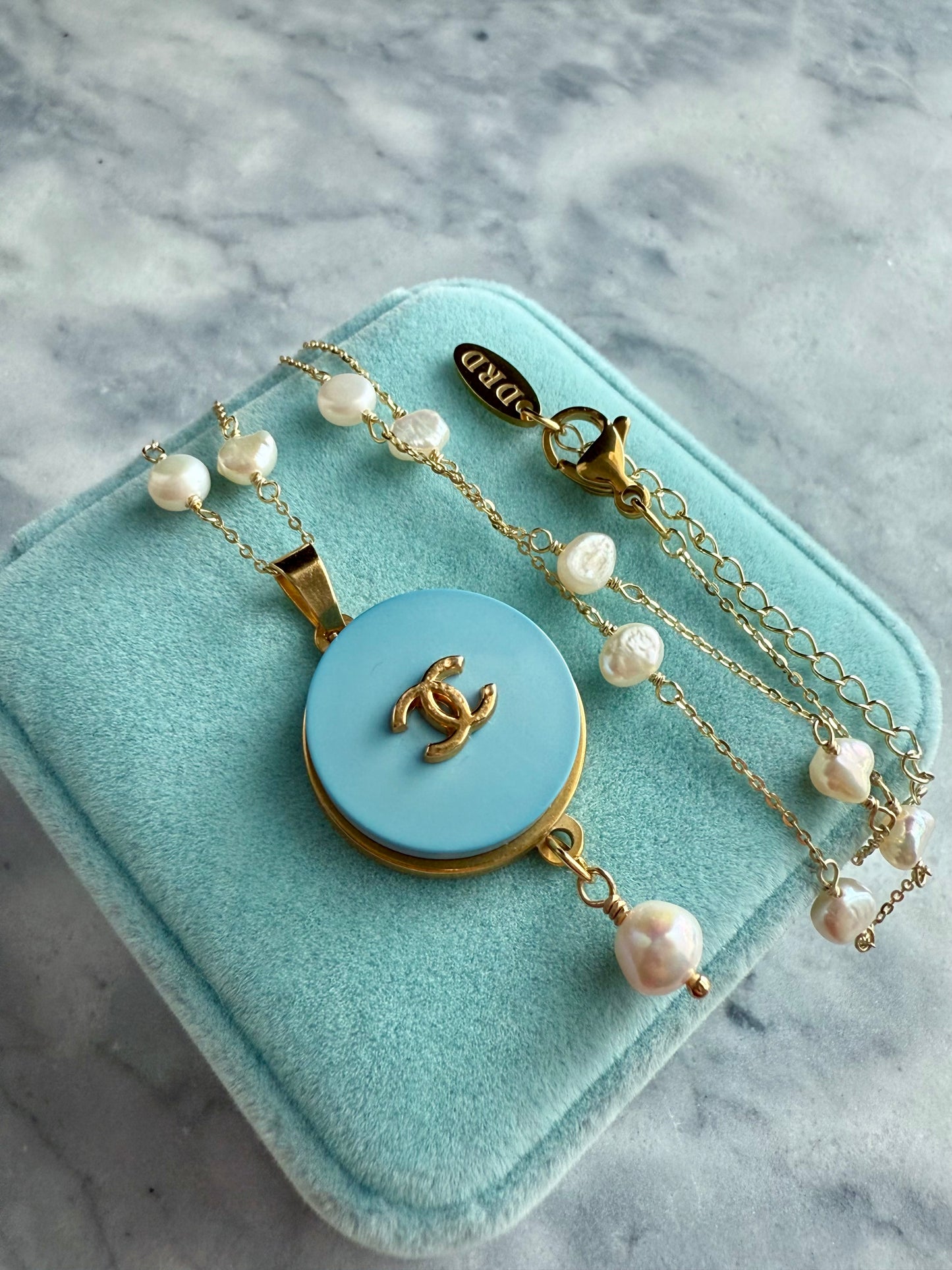 🩵 One of a kind delicate Authentic Reworked button necklace