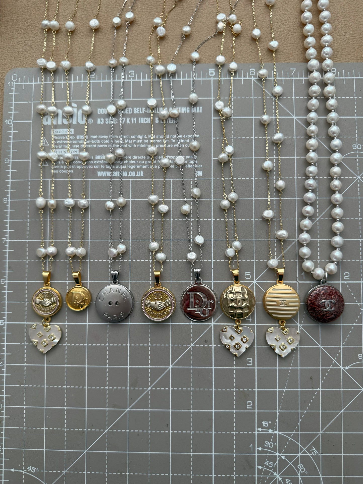 ✨ One of a kind delicate Authentic Reworked button necklace