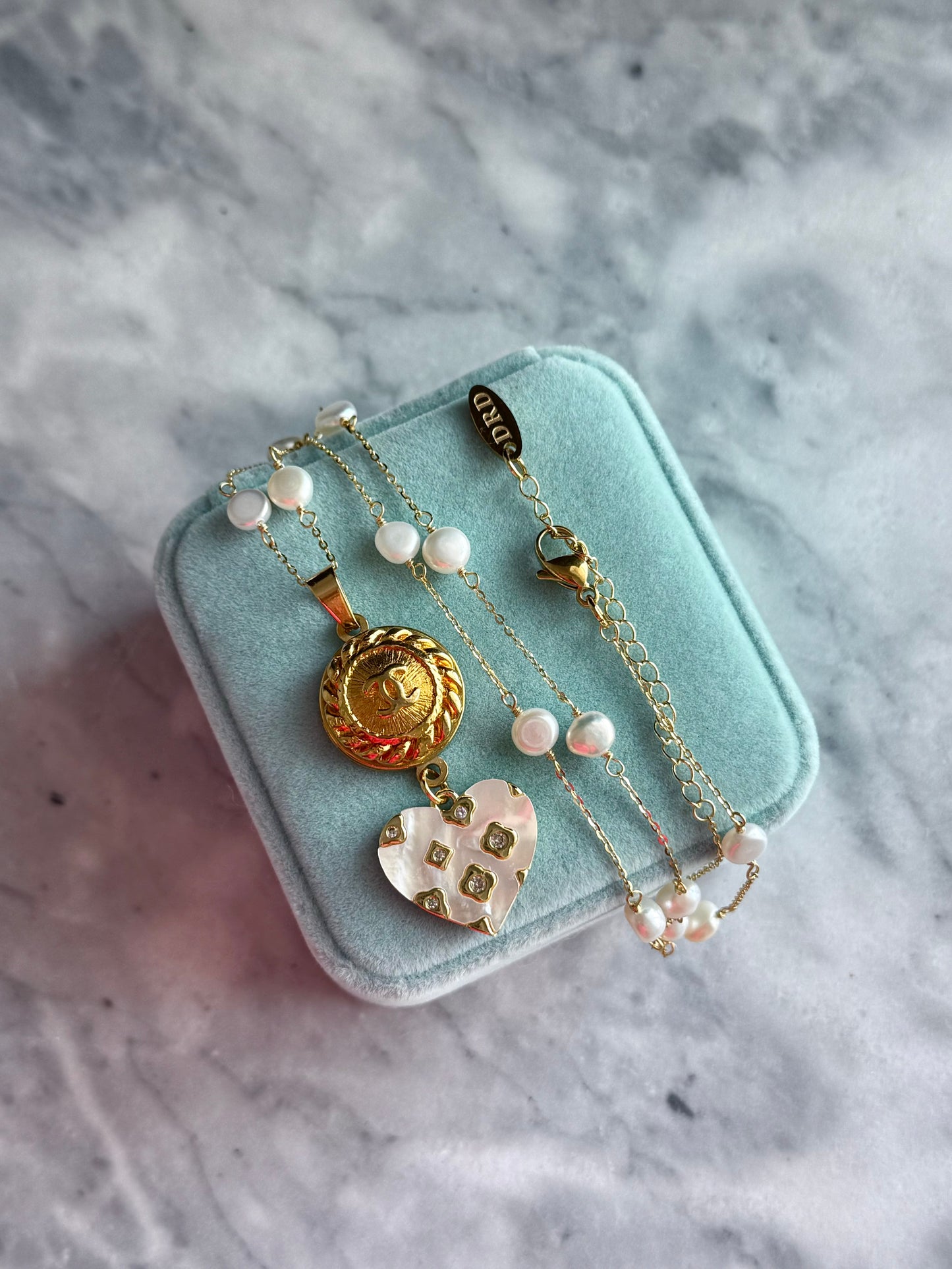 🤍 One of a kind delicate Authentic Reworked button necklace