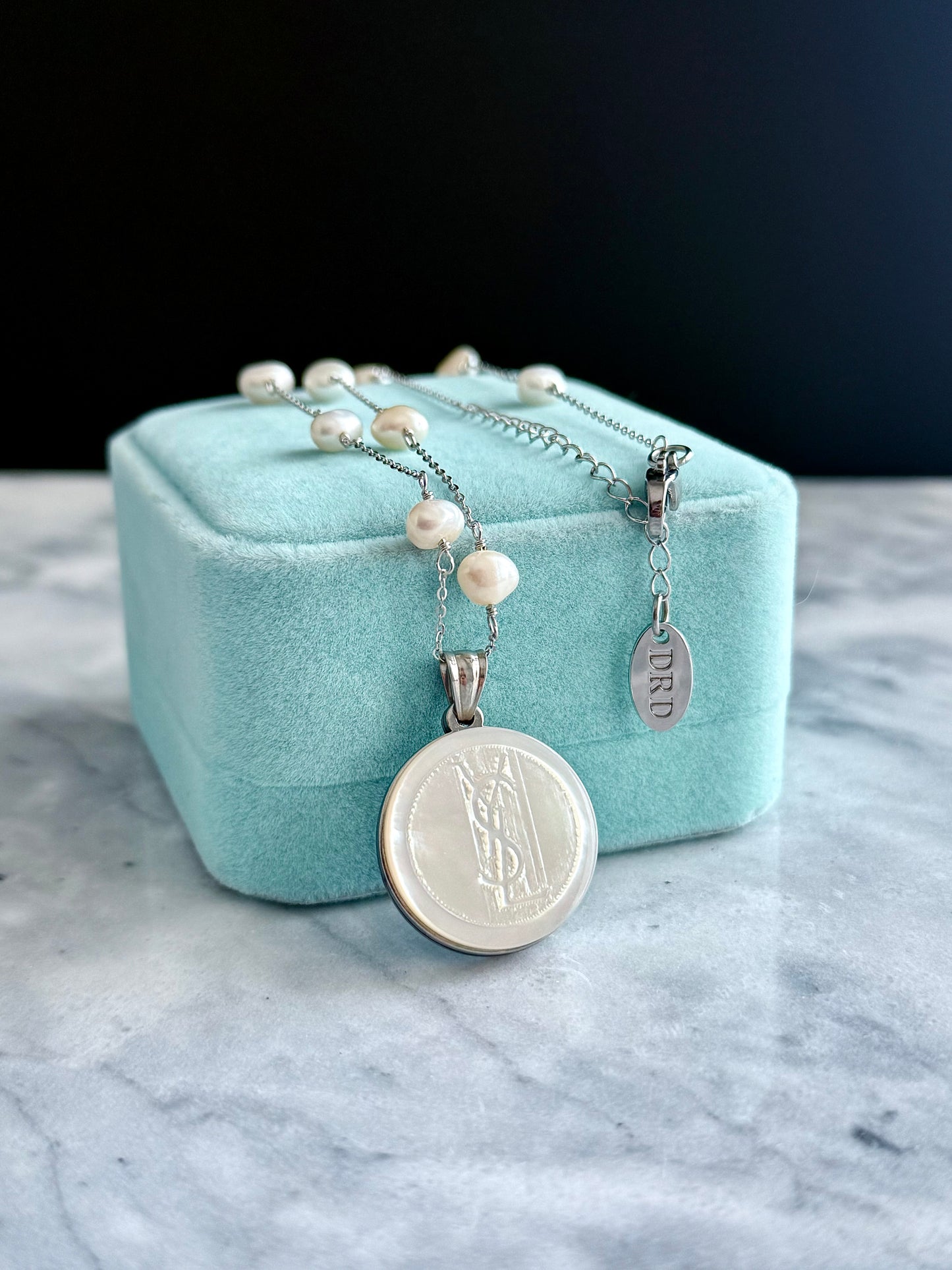 🤍 One of a kind Authentic YSL Reworked button pearl necklace -