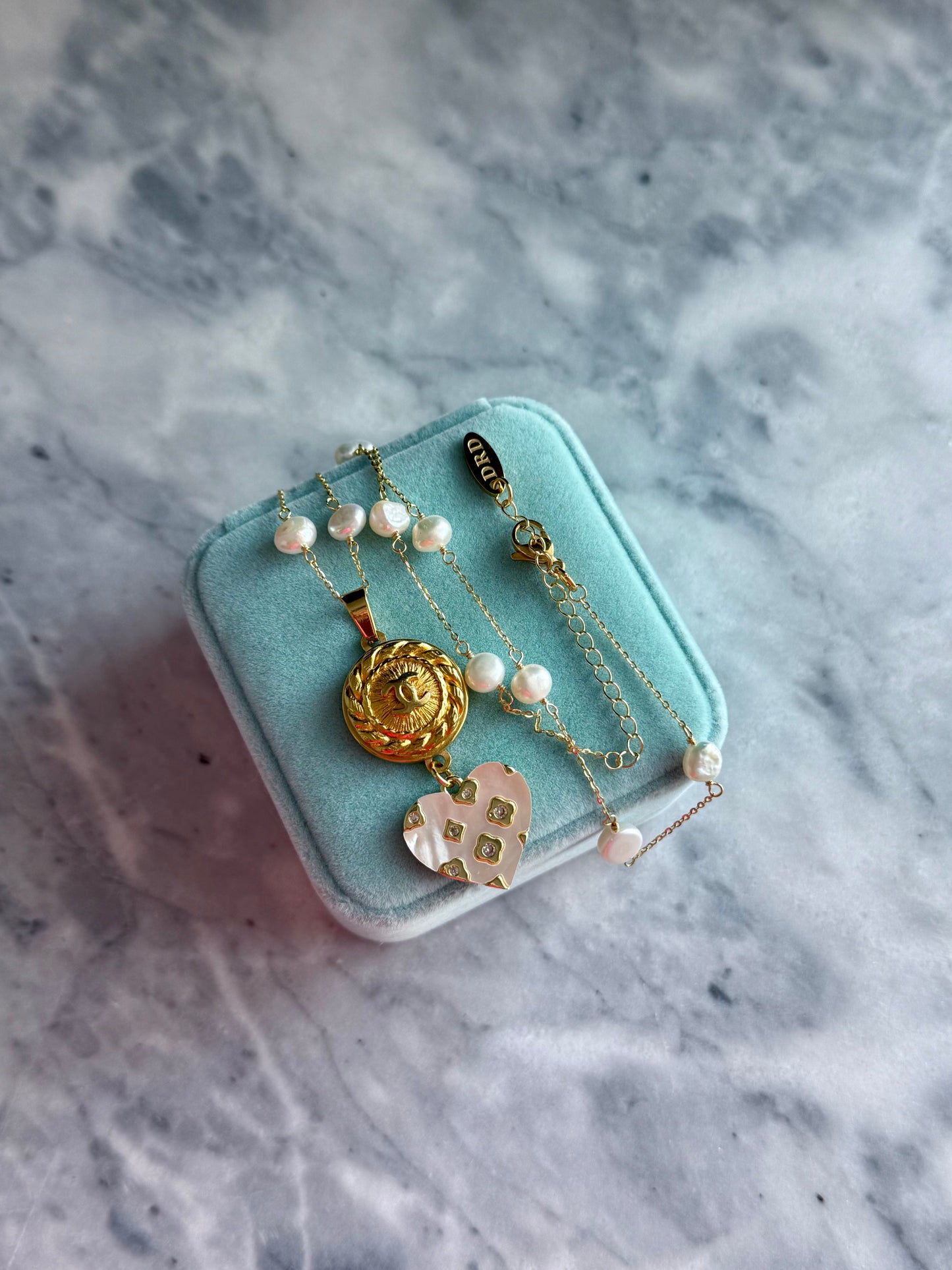 🤍 One of a kind delicate Authentic Reworked button necklace