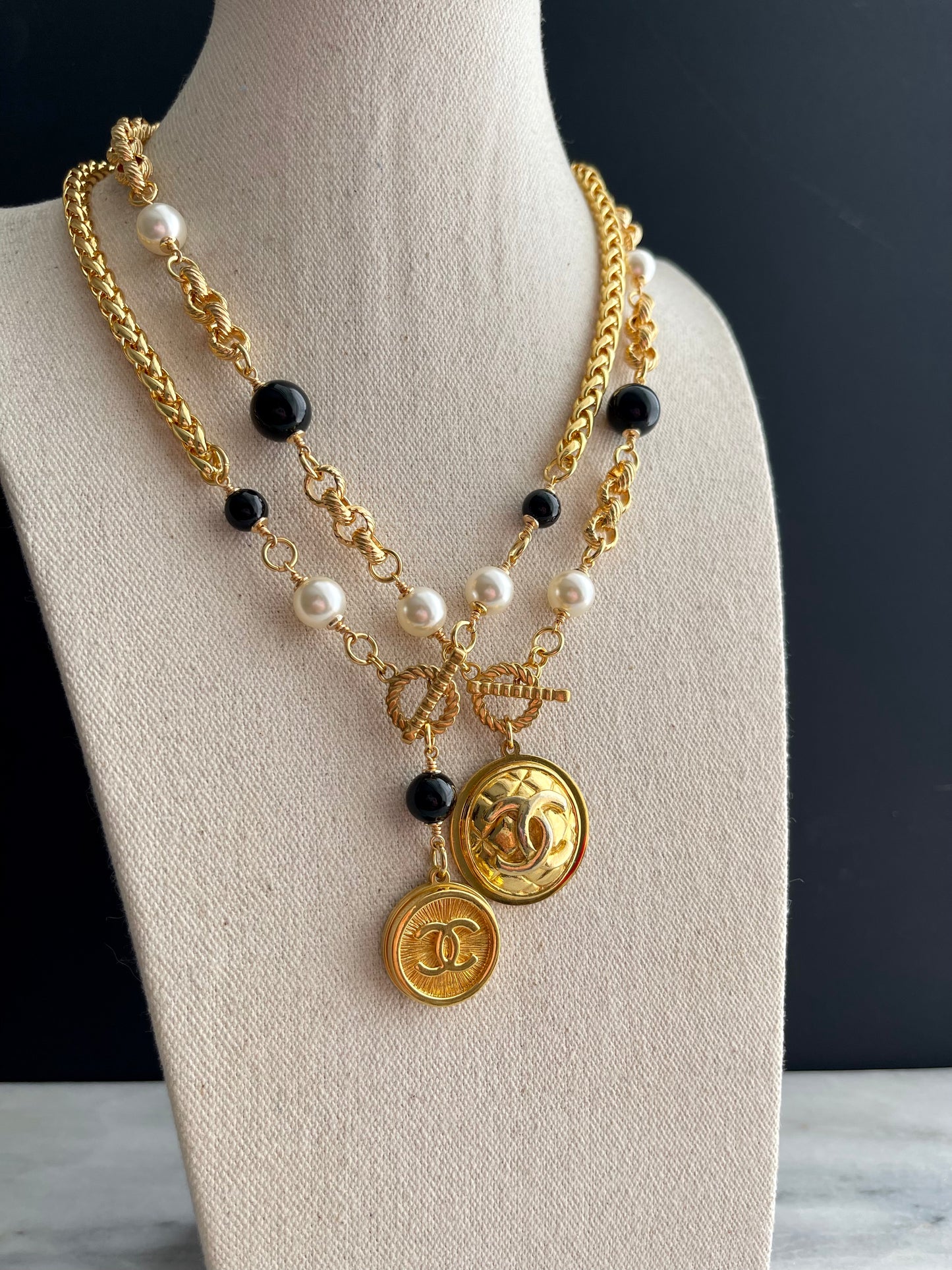Huge One of a kind black and white pearls and Authentic Reworked button necklace