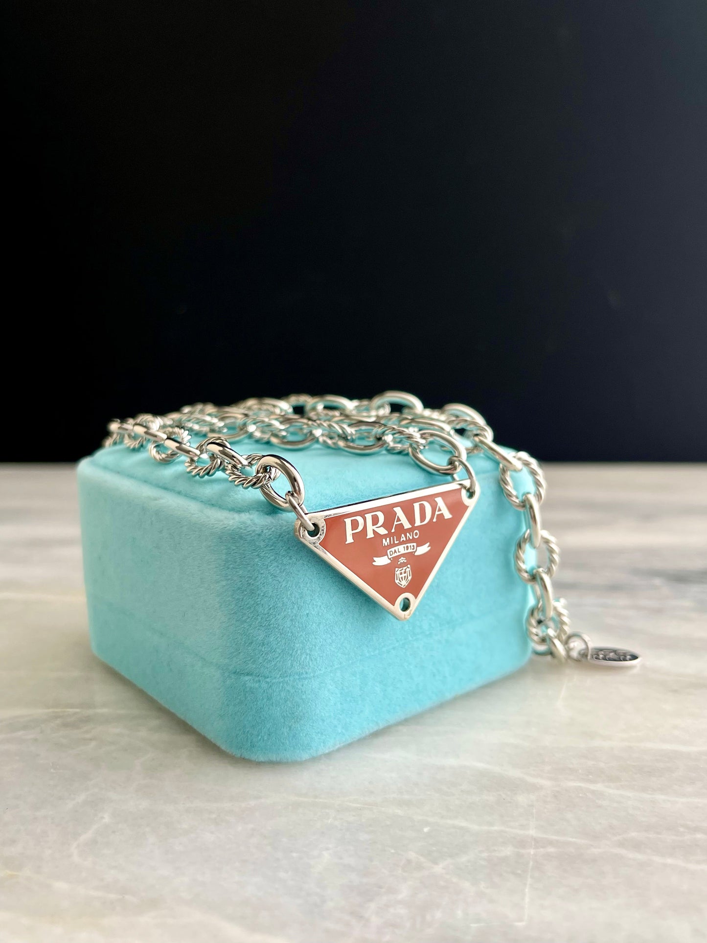 Authentic Large silver PRADA charm Necklace in Burnt Orange