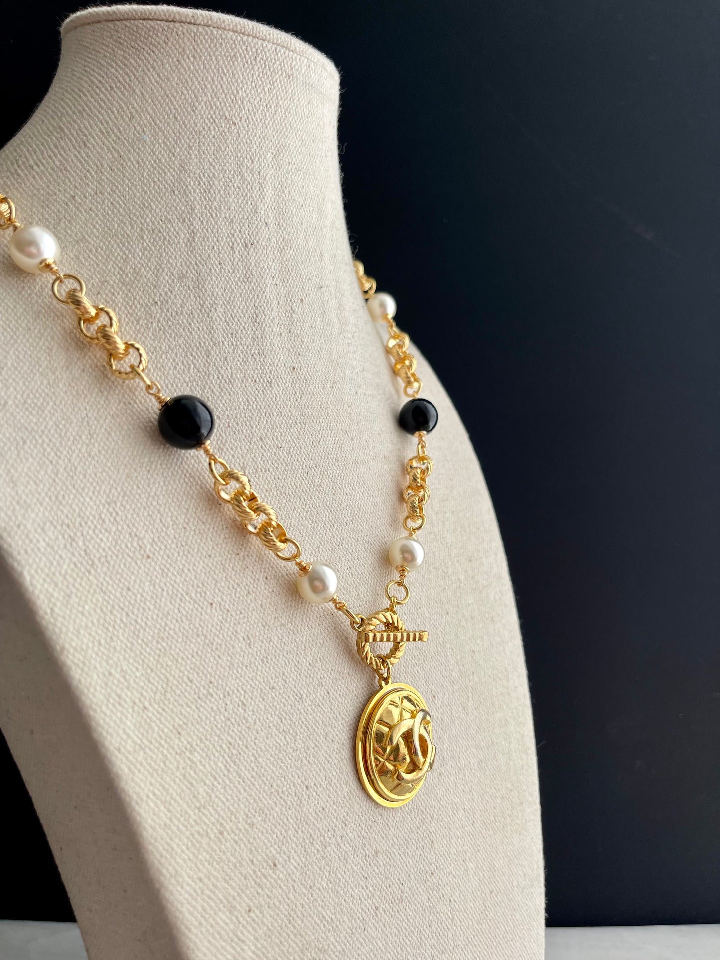 Huge One of a kind black and white pearls and Authentic Reworked button necklace