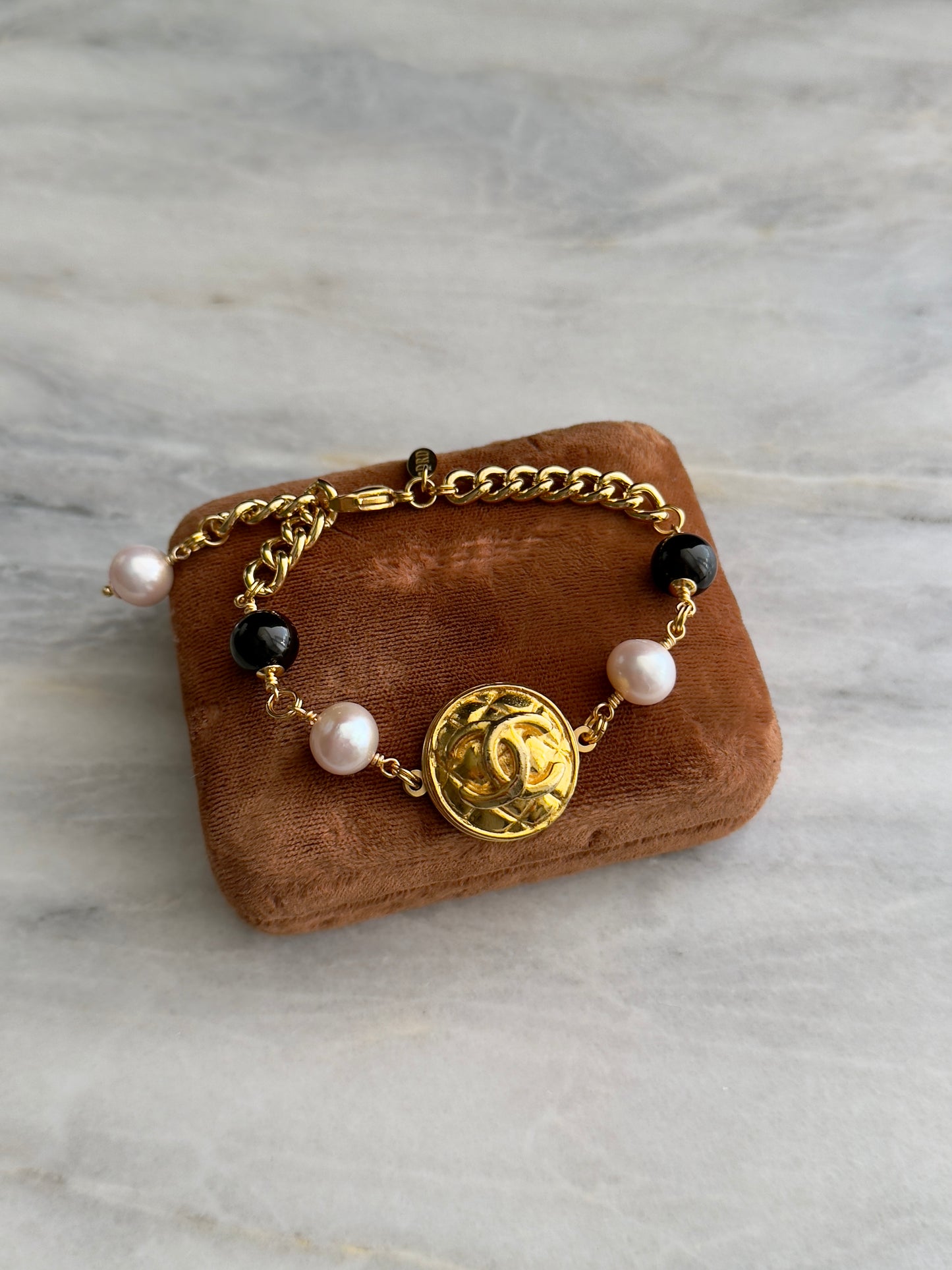 Gold chunky Authentic Reworked button bracelet with onyx and baroque pearls 🖤