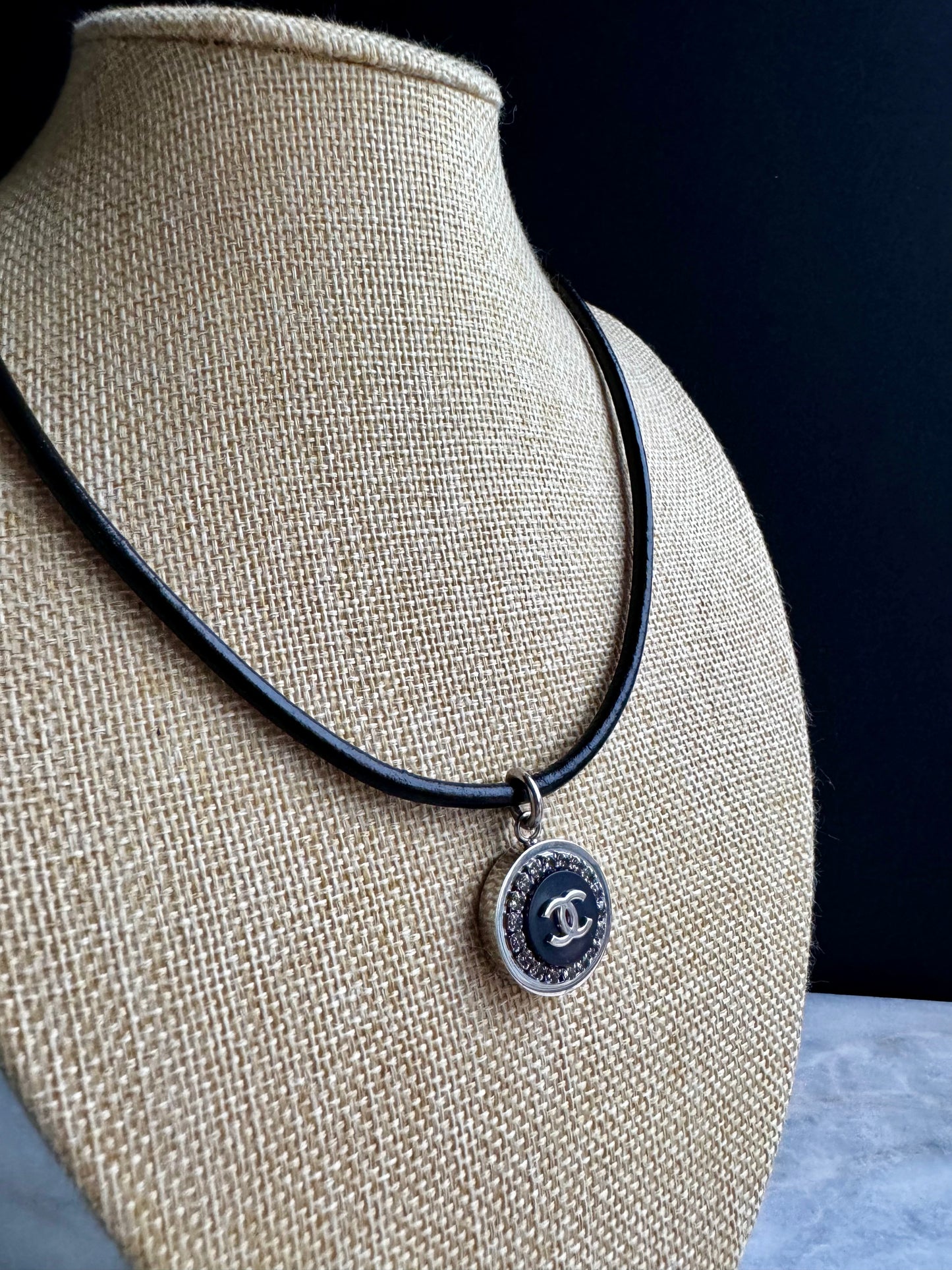 Authentic Reworked silver Button made with a leather necklace