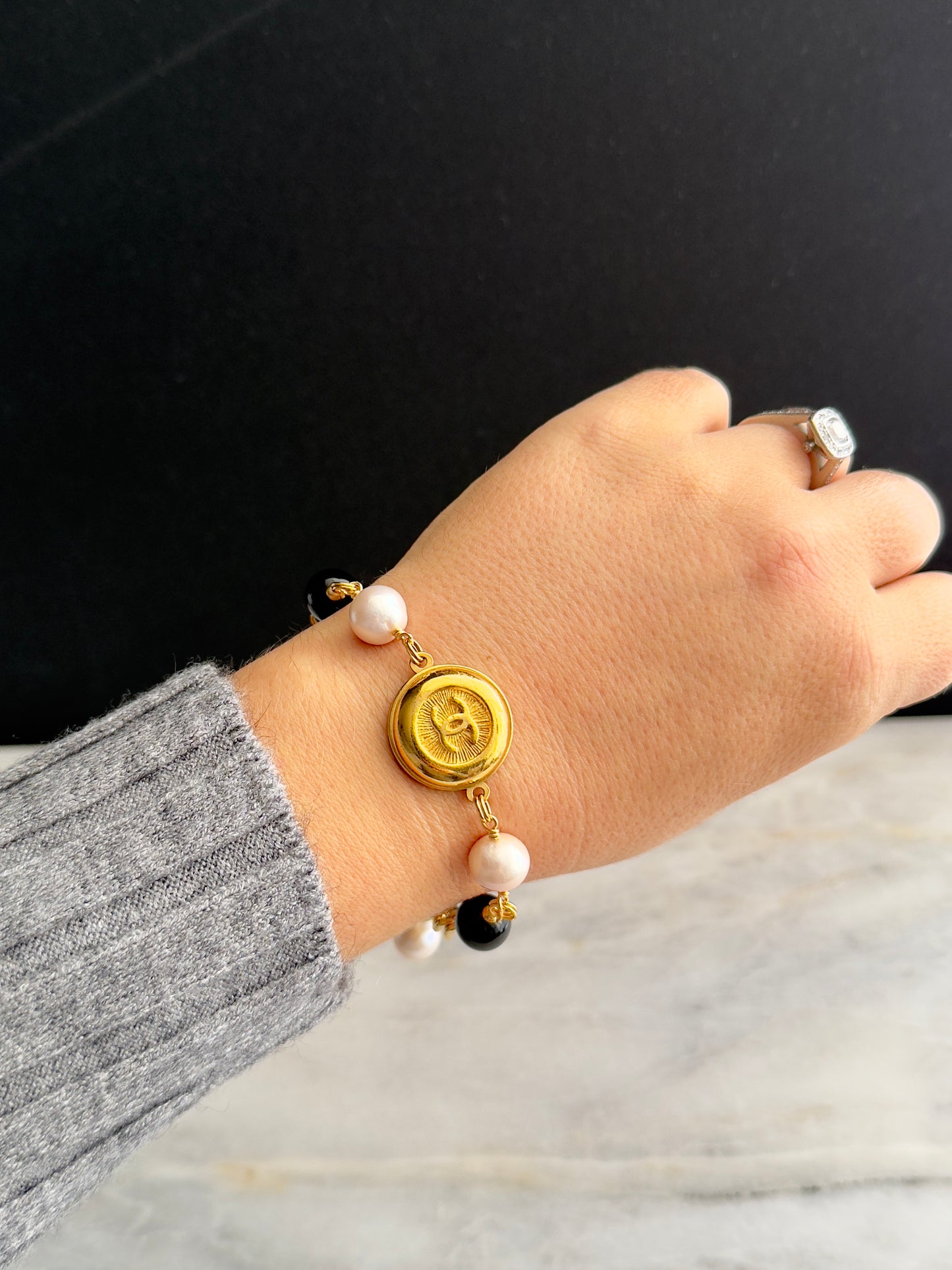 Gold chunky Authentic Reworked button bracelet with onyx and baroque pearls 🖤