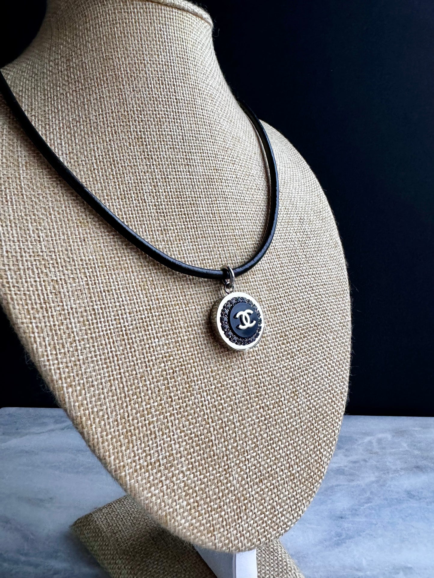 Authentic Reworked silver Button made with a leather necklace