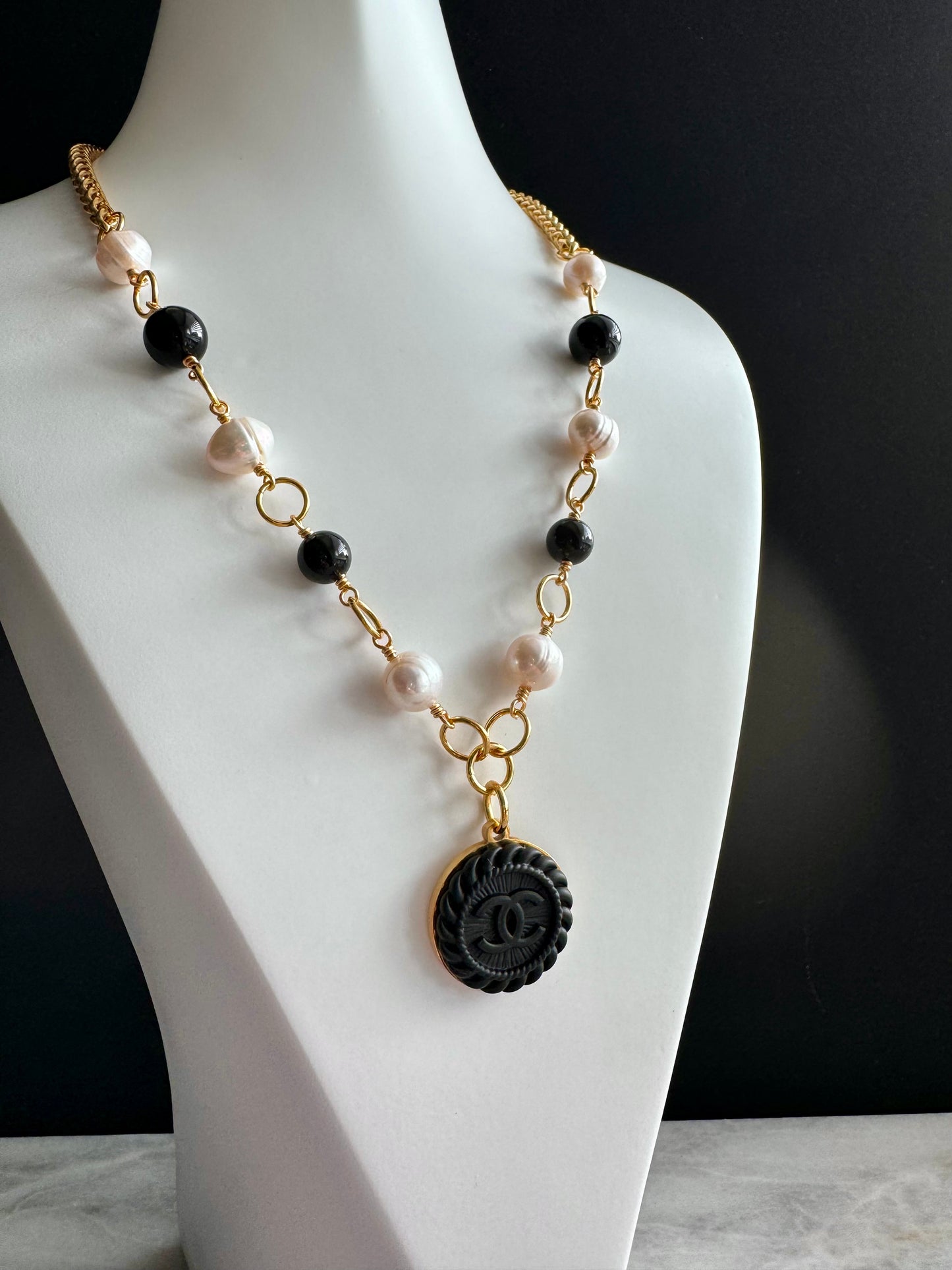 One of a kind black and white pearls and Authentic Reworked button necklace