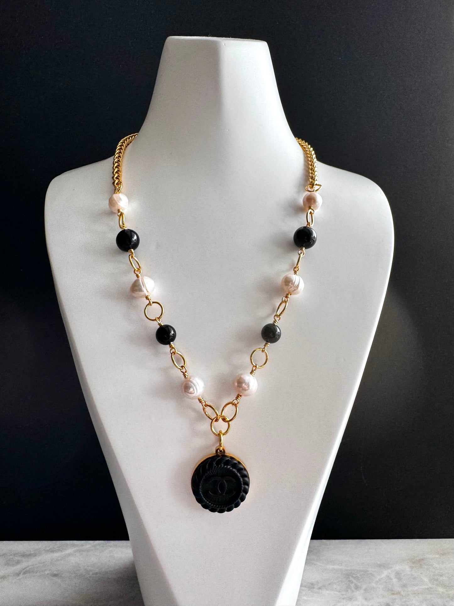 One of a kind black and white pearls and Authentic Reworked button necklace