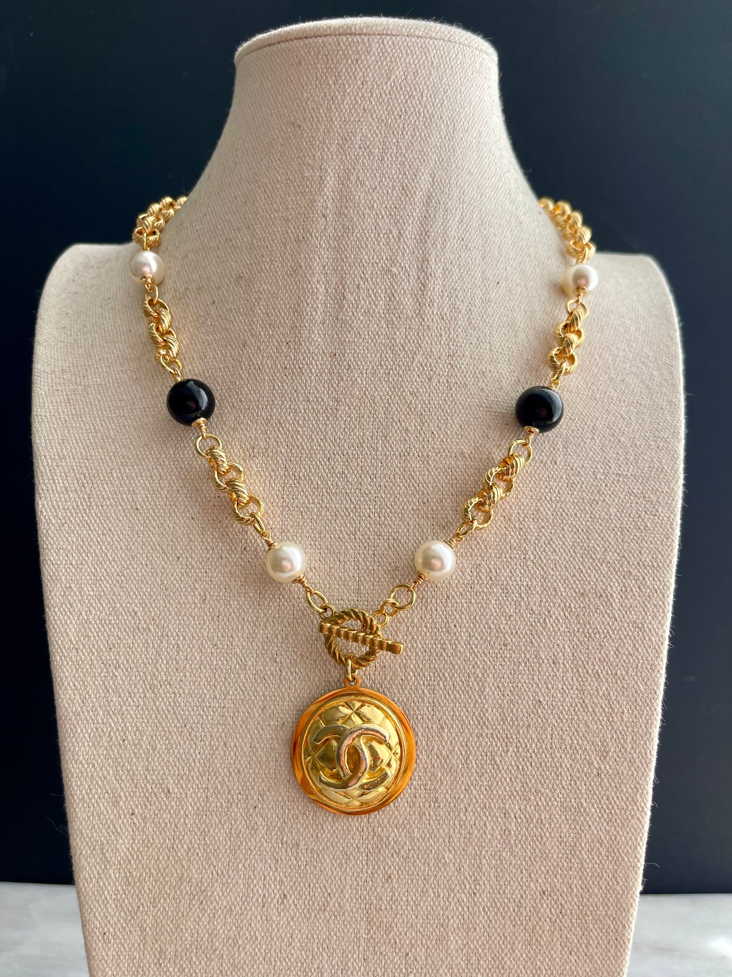Huge One of a kind black and white pearls and Authentic Reworked button necklace
